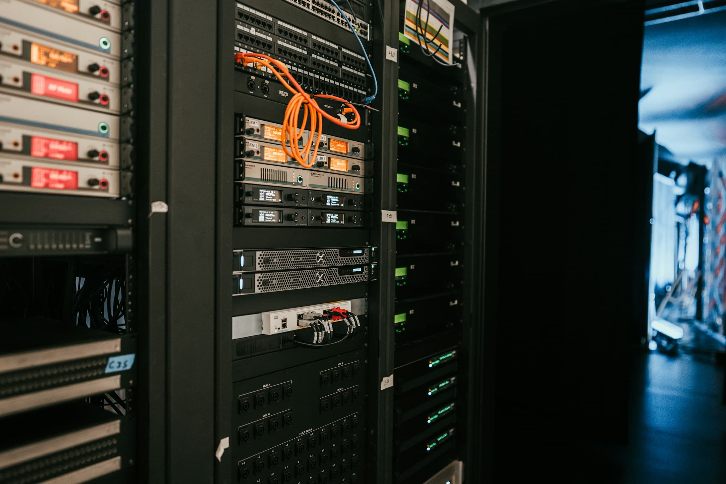 Server rack and networking equipment with cabling in a data center