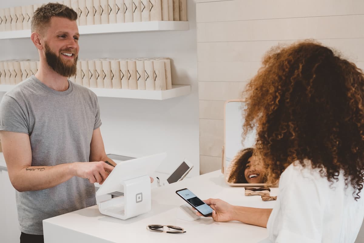 Person shopping online with credit card representing automated e-commerce