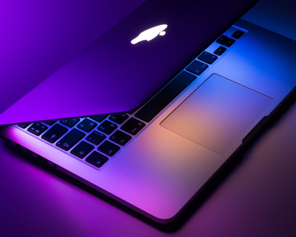 MacBook Pro on a desk representing the new models with M5 Pro and M5 Max chips