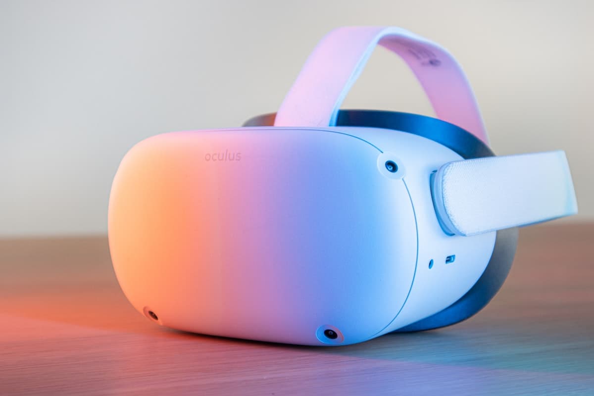Person wearing VR virtual reality glasses representing Meta's metaverse decline
