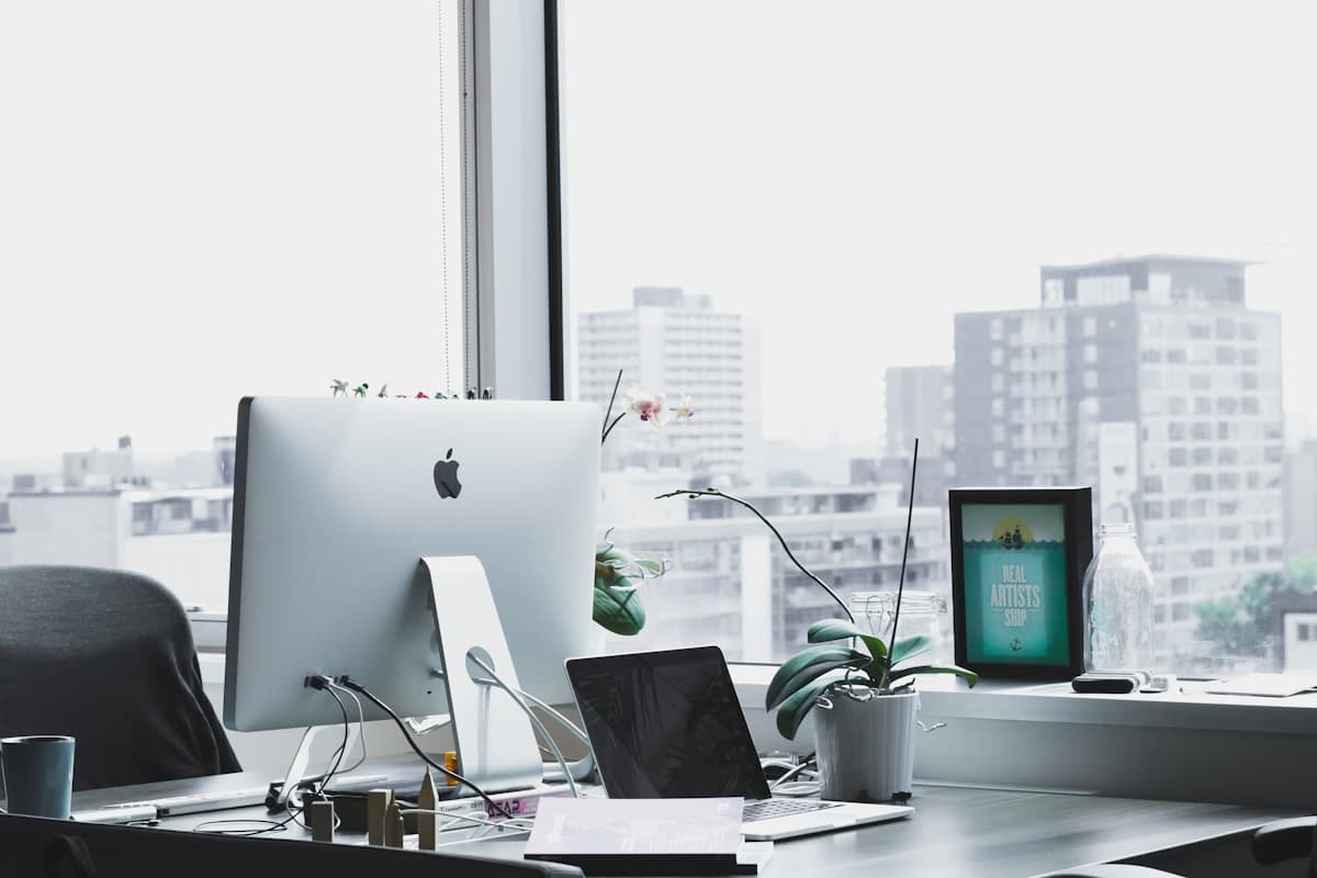 Modern office workspace with laptop representing Microsoft 365 business environment